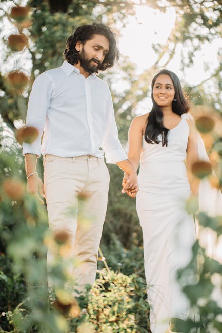 A healthy couple walking together in a sunlit forest representing community and wellness